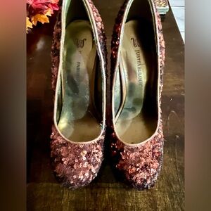 Women’s brown sequin heels.